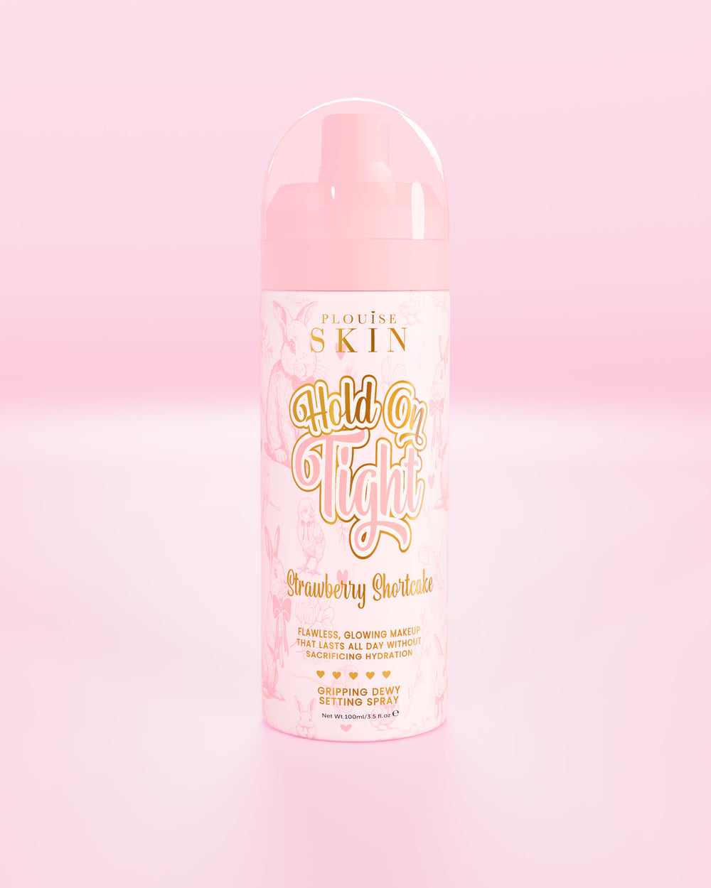 Botella rosa de P.Louise Hond On Tight, spray fijador húmedo y adherente en tarta de fresas