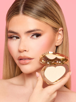 P. Louise bajo el polvo iluminante